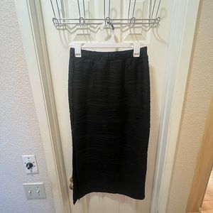 Textured Black mid length skirt.